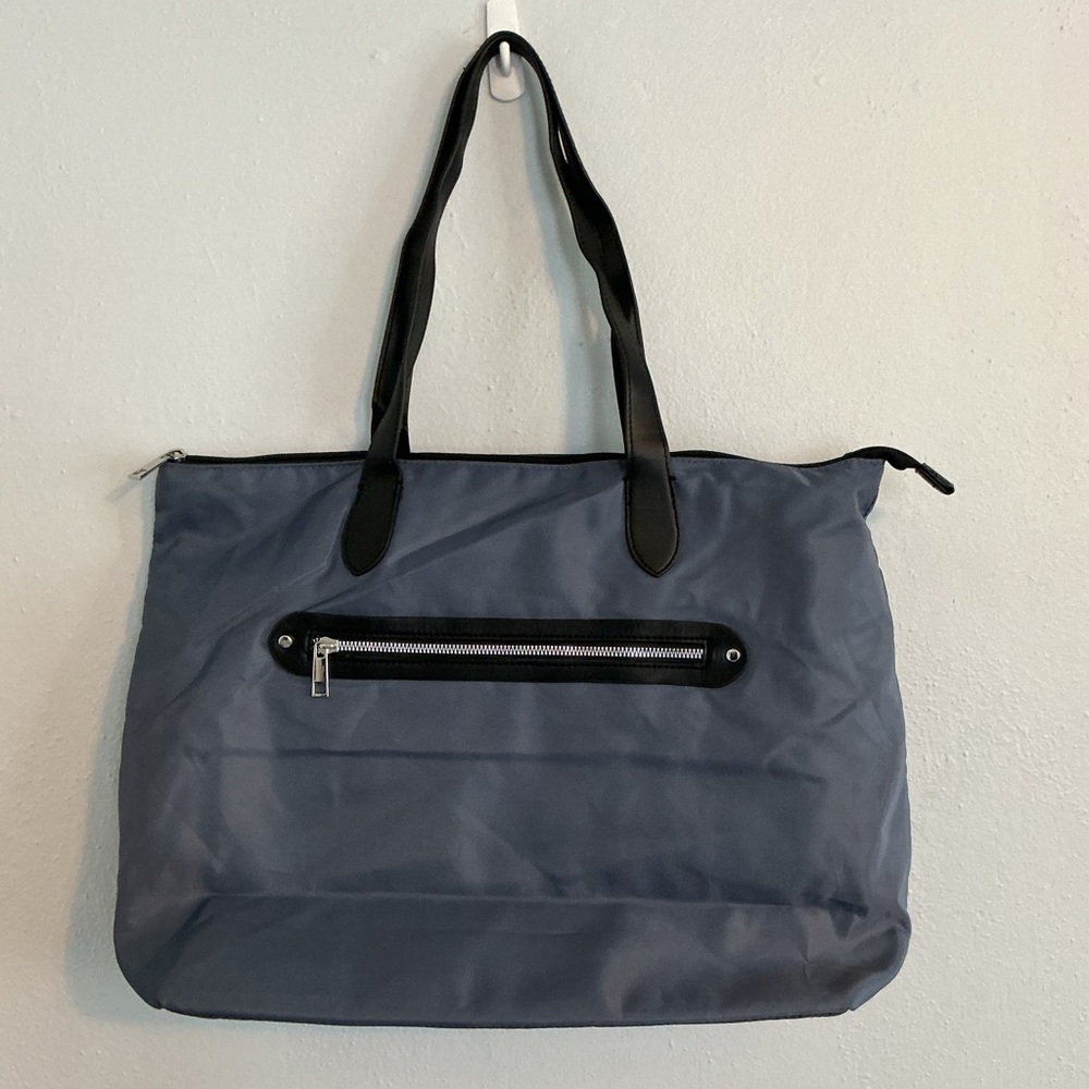 A New Day Woman’s Blue Tote Bag.
